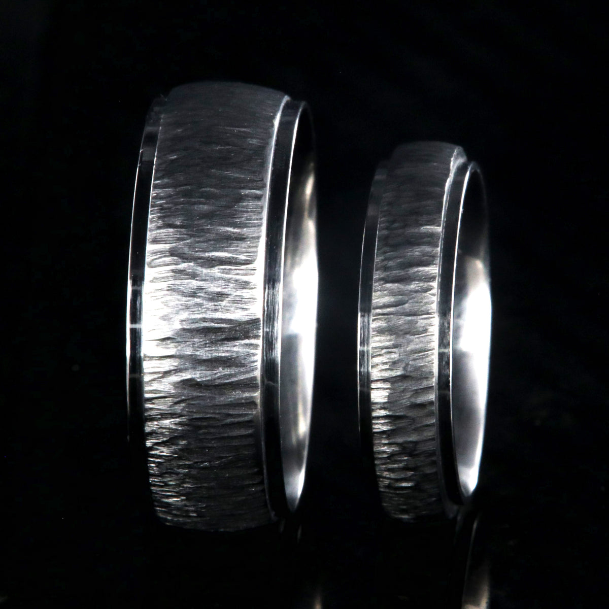 8mm and 5mm wide matching titanium wedding bands with a tree bark raised center