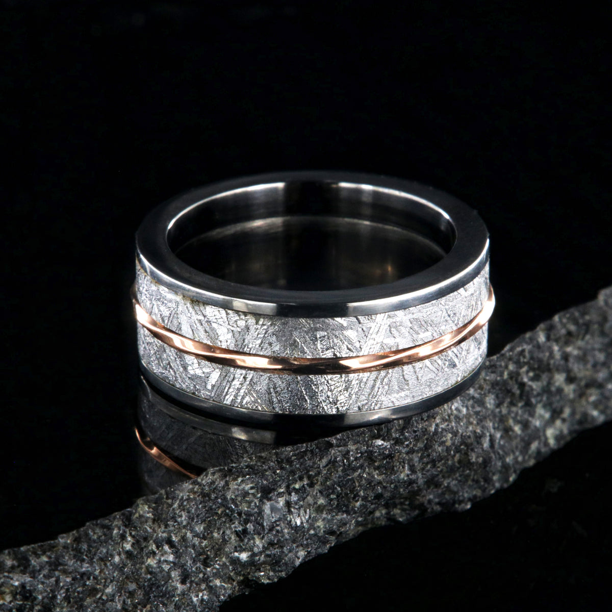 10mm wide Gibeon meteorite wedding band for men with twisted rose gold inlay
