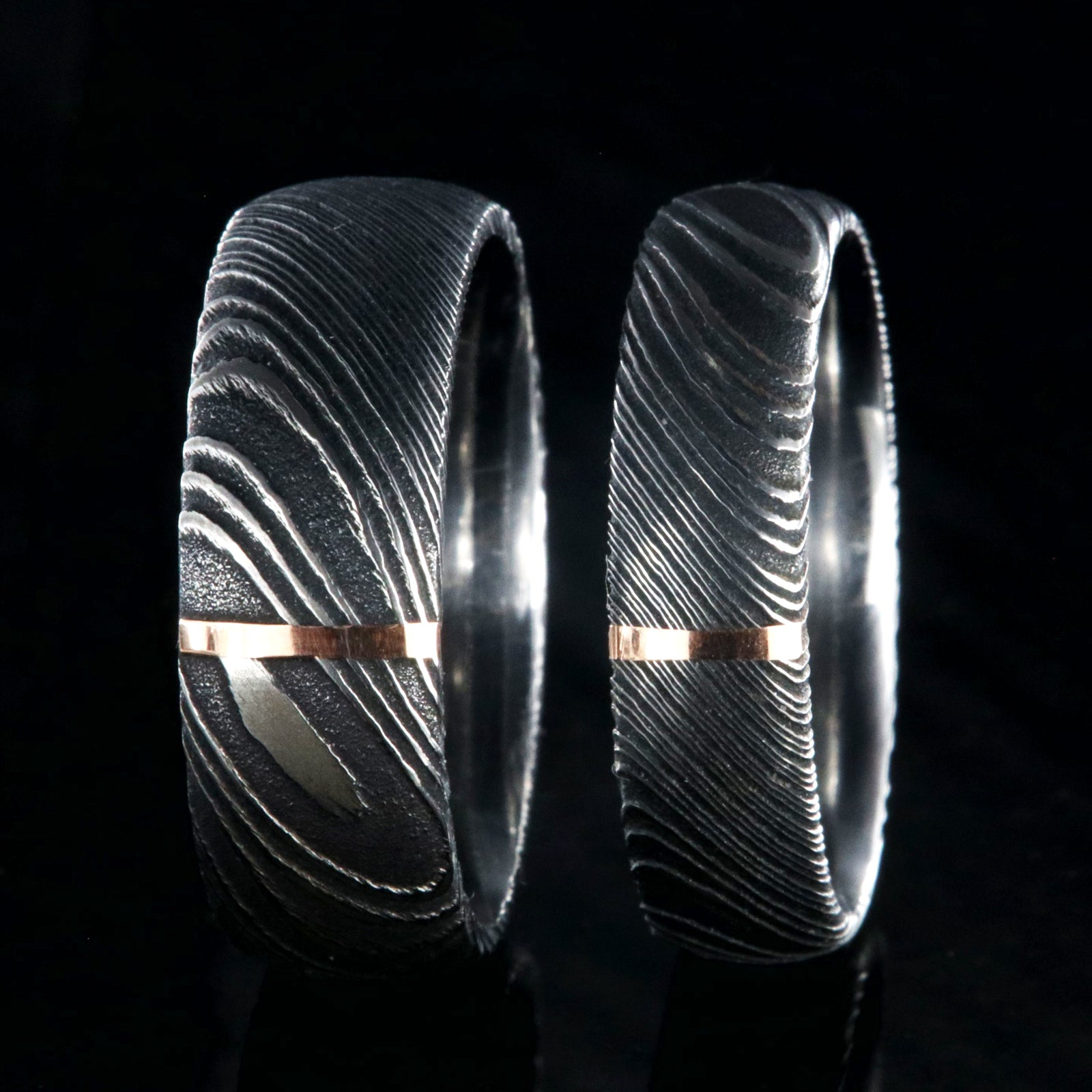 8mm and 6mm wide Damascus steel wedding band set with vertical rose gold inlay