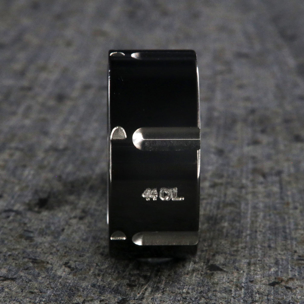 10mm wide black zirconium wedding band with a .44 caliber design