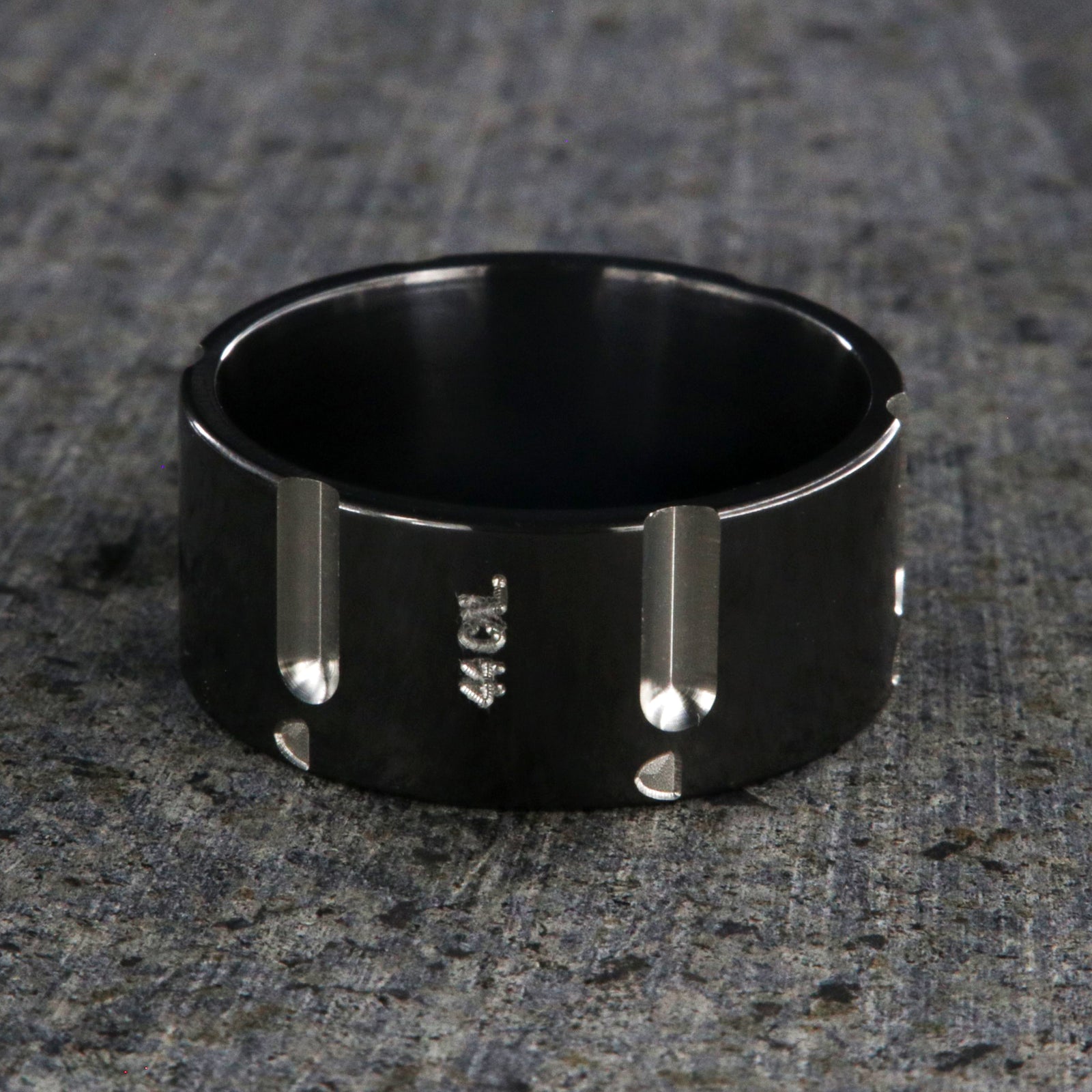 10mm wide black zirconium wedding band with a .44 caliber design
