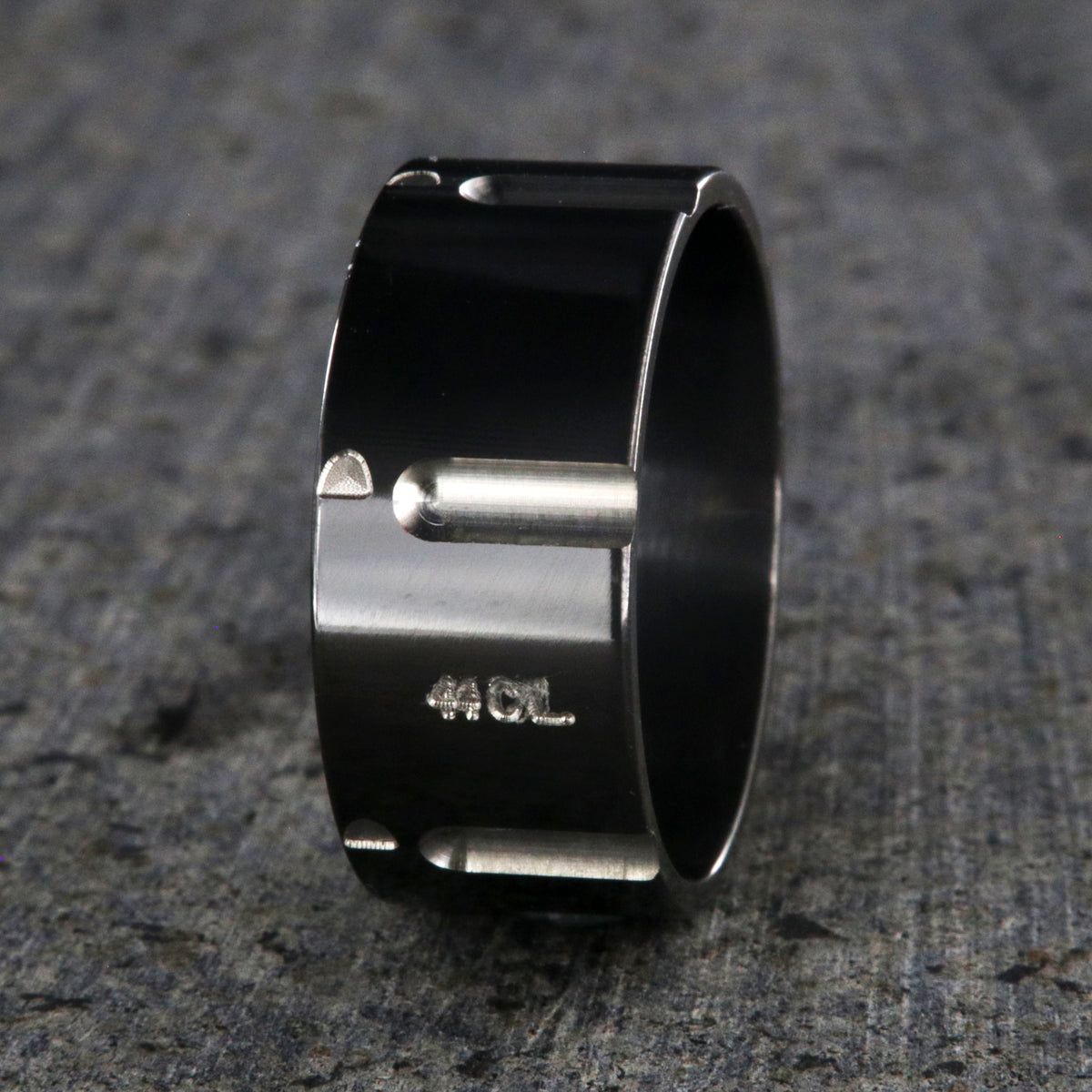 10mm wide black zirconium wedding band with a .44 caliber design