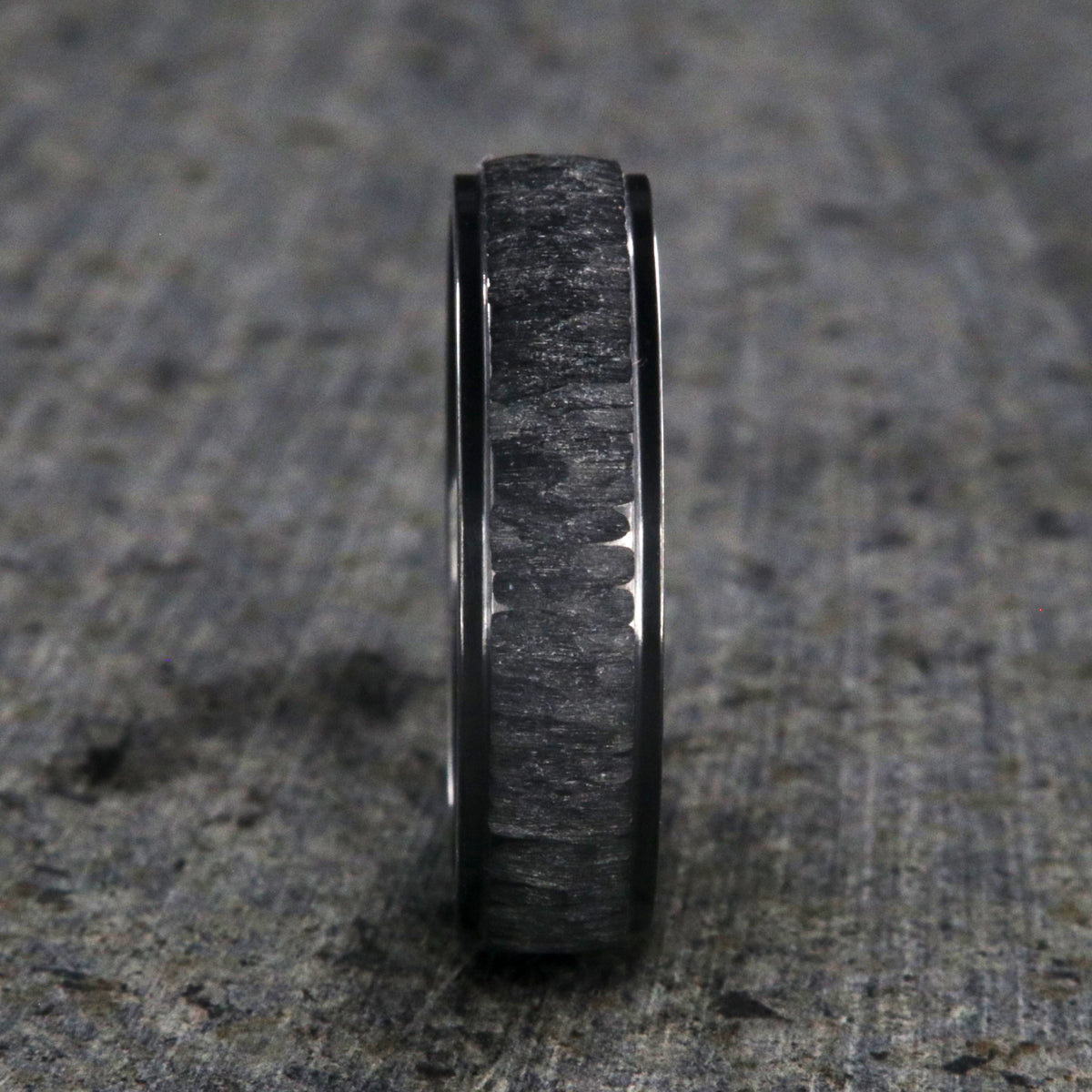 5mm wide black zirconium ring with a raised-center and tree bark finish