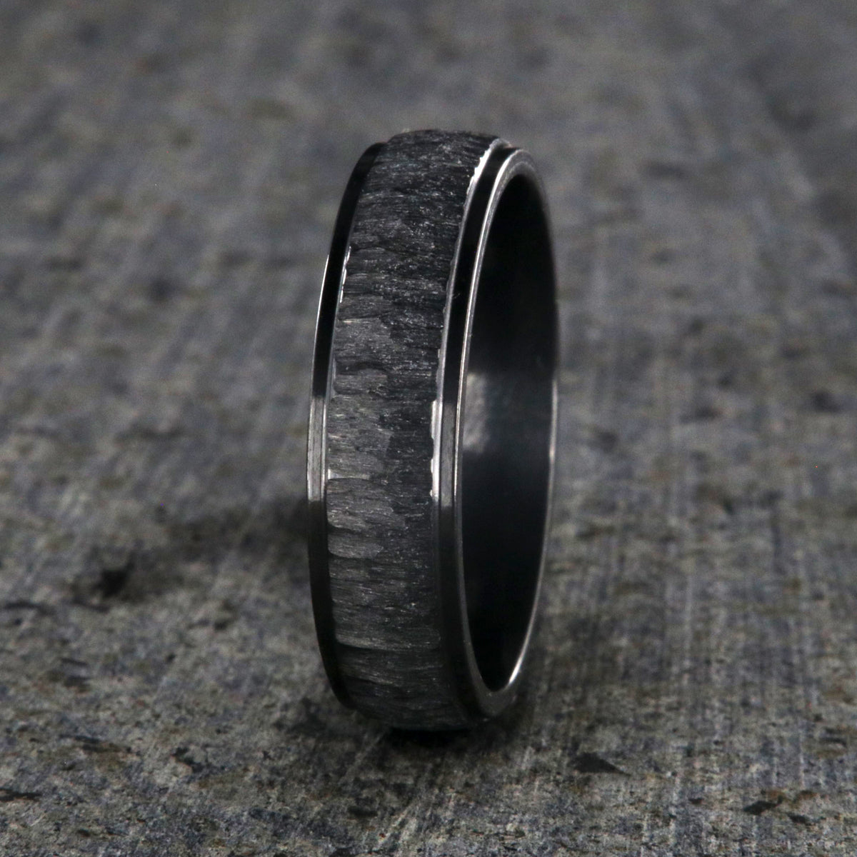 5mm wide black zirconium ring with a raised-center and tree bark finish