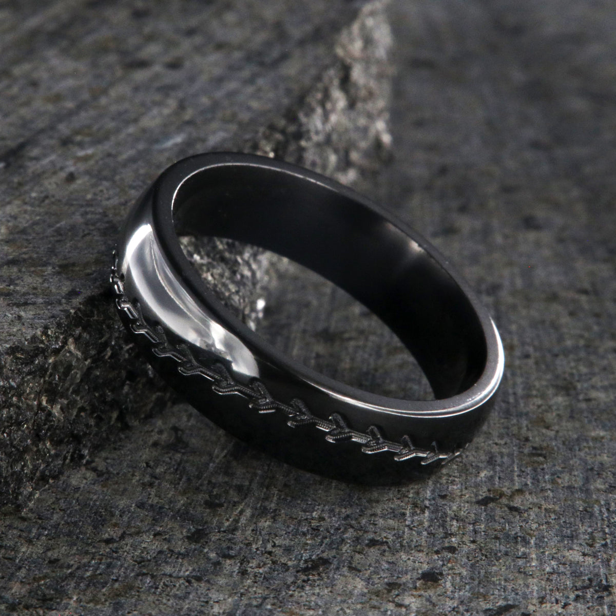 6mm wide black zirconium baseball ring with milled baseball stitching