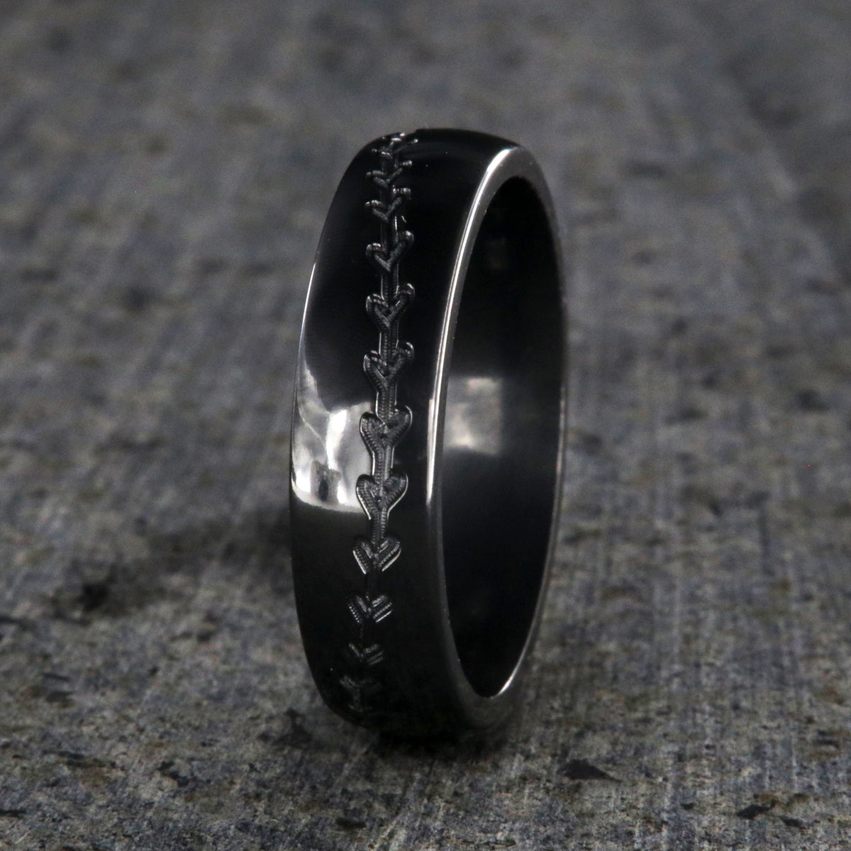 6mm wide black zirconium baseball ring with milled baseball stitching