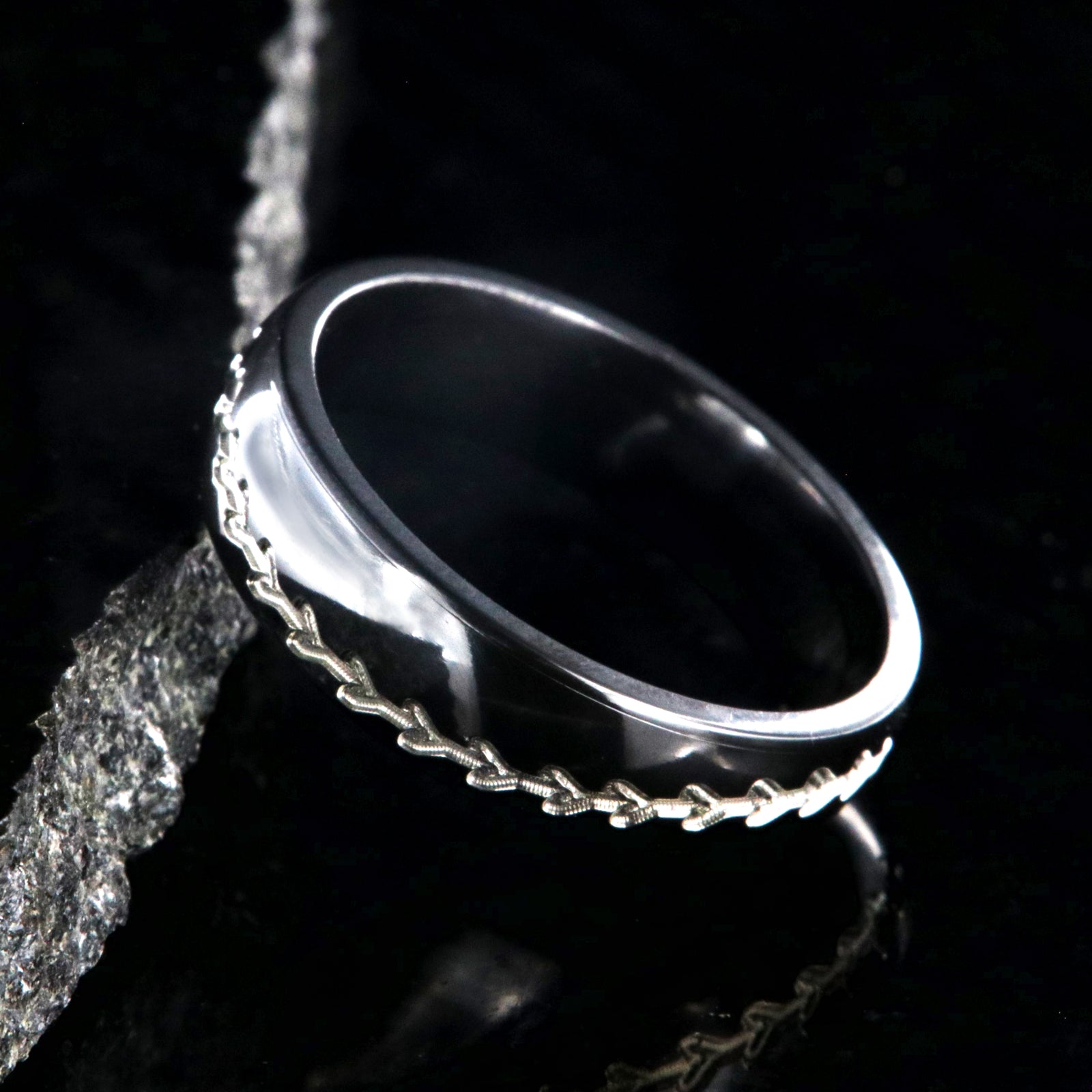6mm wide black zirconium baseball ring with two-toned baseball stitching