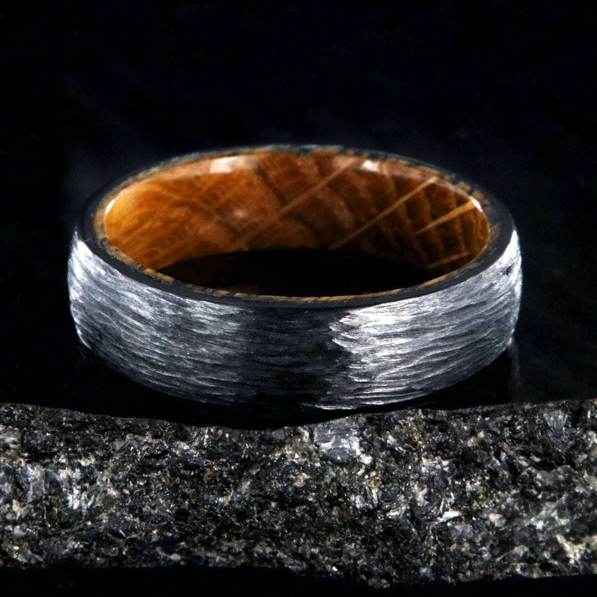 6mm wide black zirconium wedding band with a tree bark finish, whiskey barrel sleeve, and rounded profile