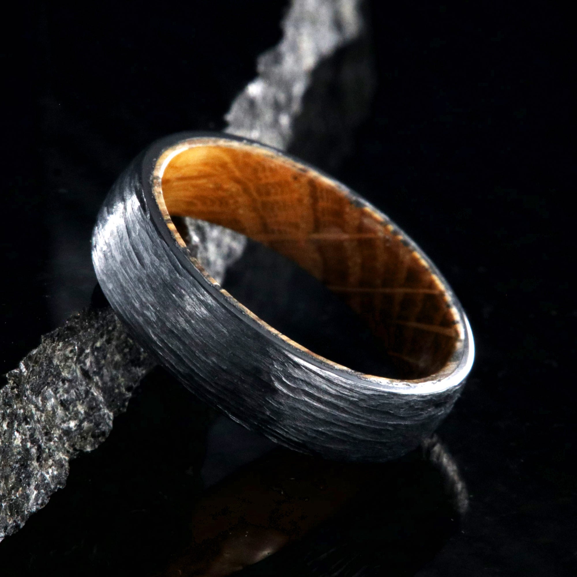 6mm wide black zirconium wedding band with a tree bark finish, whiskey barrel sleeve, and rounded profile