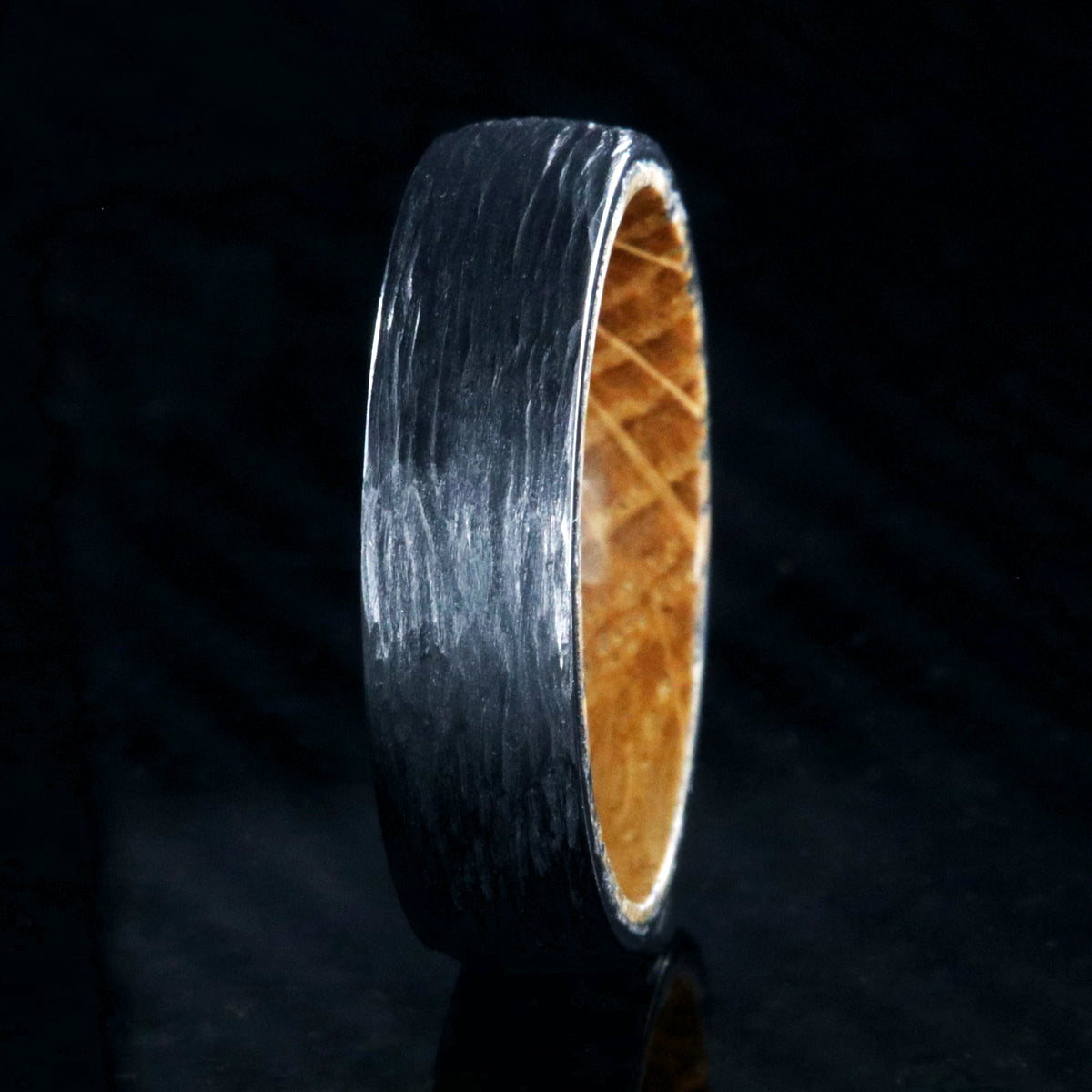 6mm wide black zirconium wedding band with a tree bark finish, whiskey barrel sleeve, and rounded profile