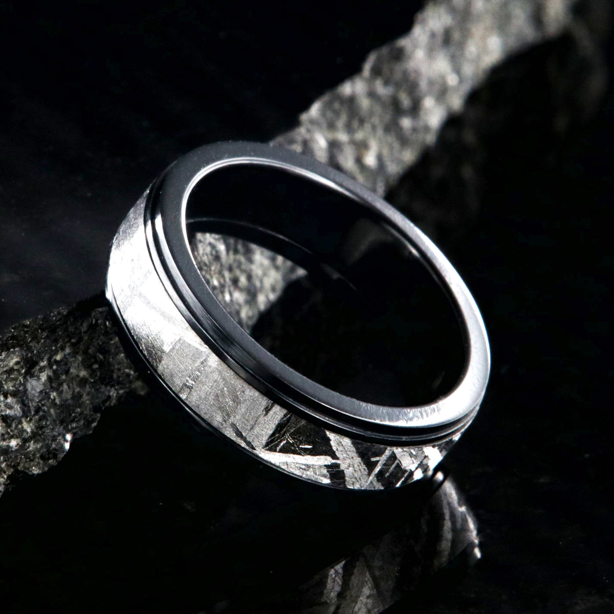 6mm wide men&#39;s meteorite wedding band with a raised center and black zirconium step edges and sleeve