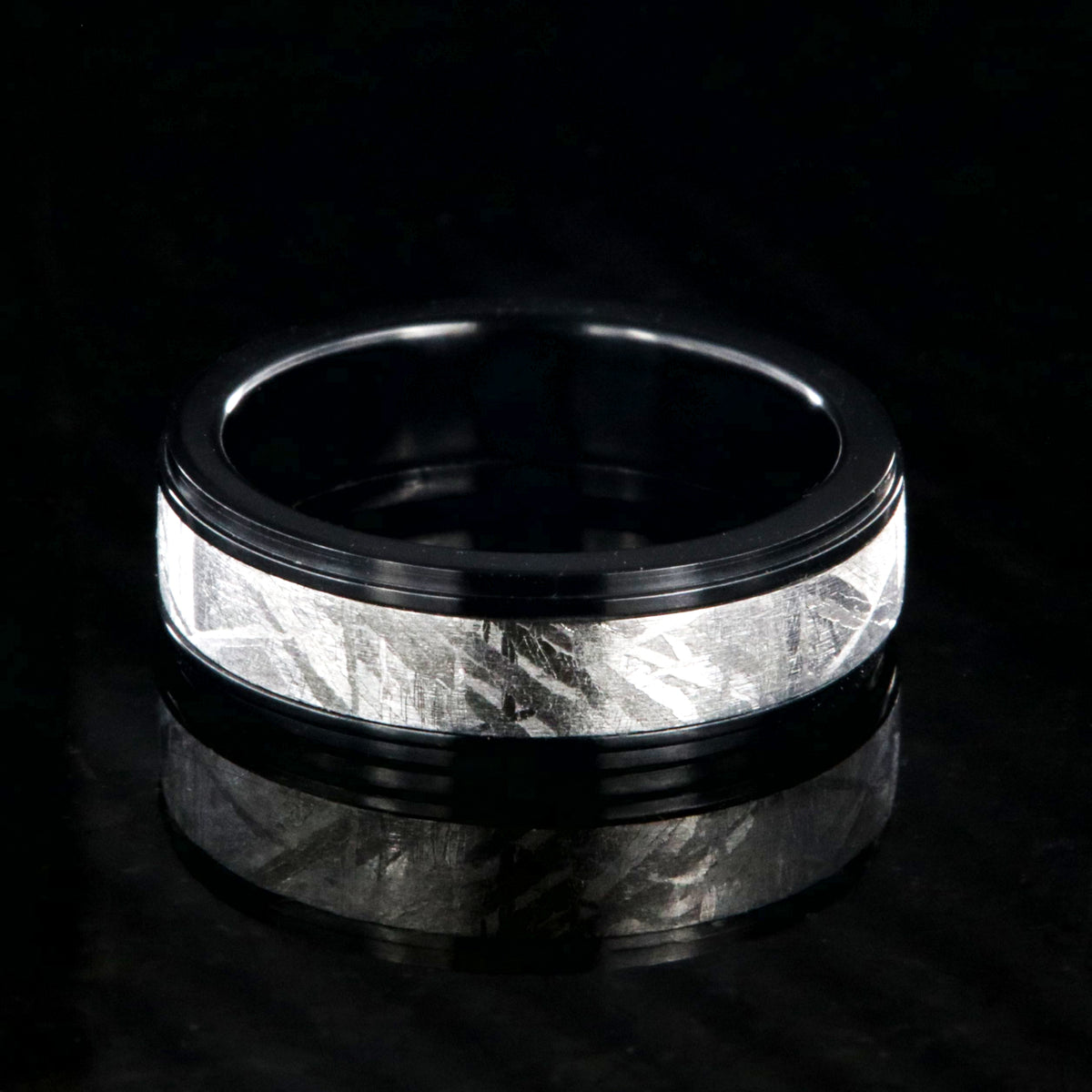 6mm wide men&#39;s meteorite wedding band with a raised center and black zirconium step edges and sleeve