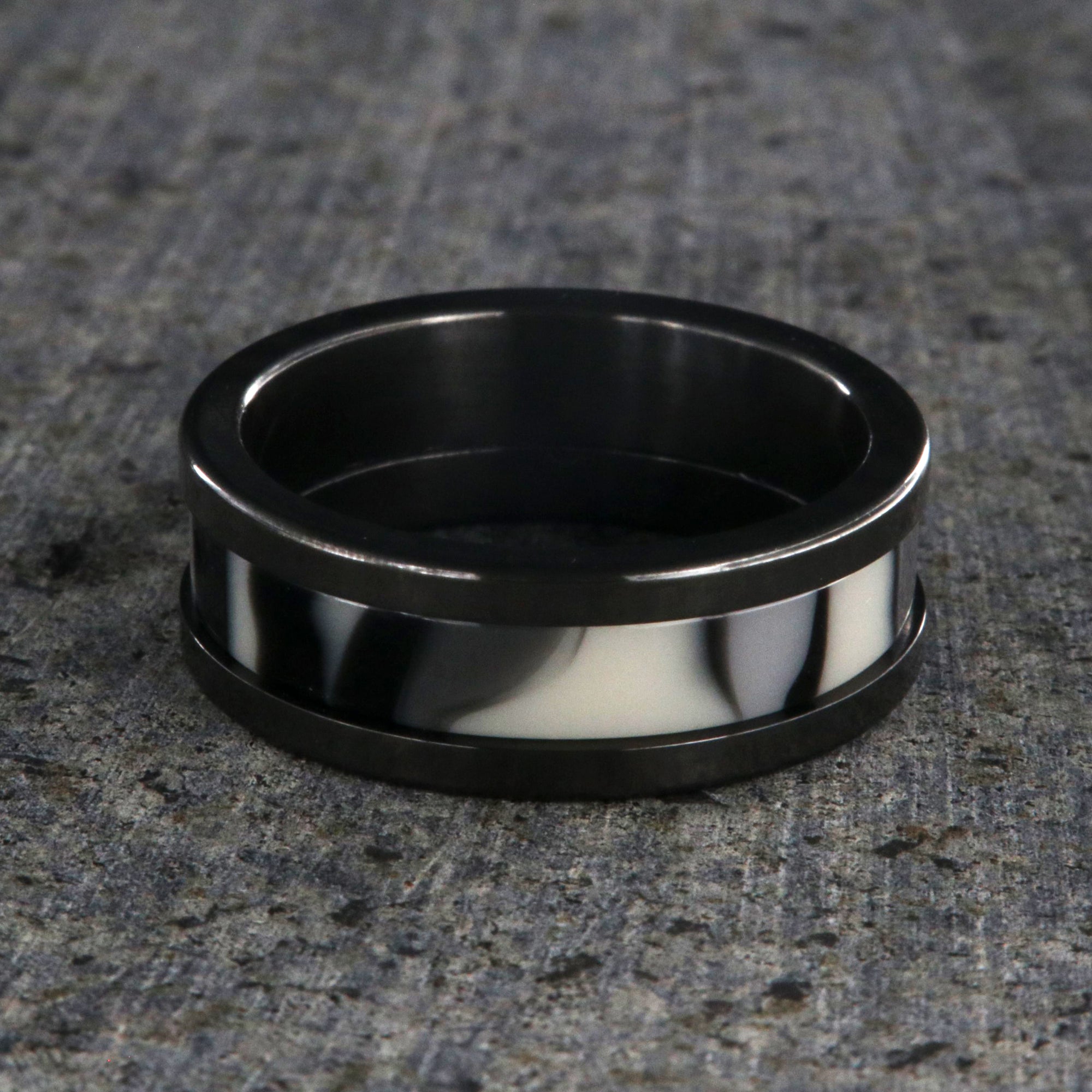 8mm wide black zirconium ring with a black and white camouflage patterned inlay