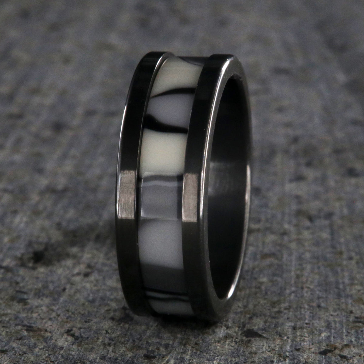 8mm wide black zirconium ring with a black and white camouflage patterned inlay