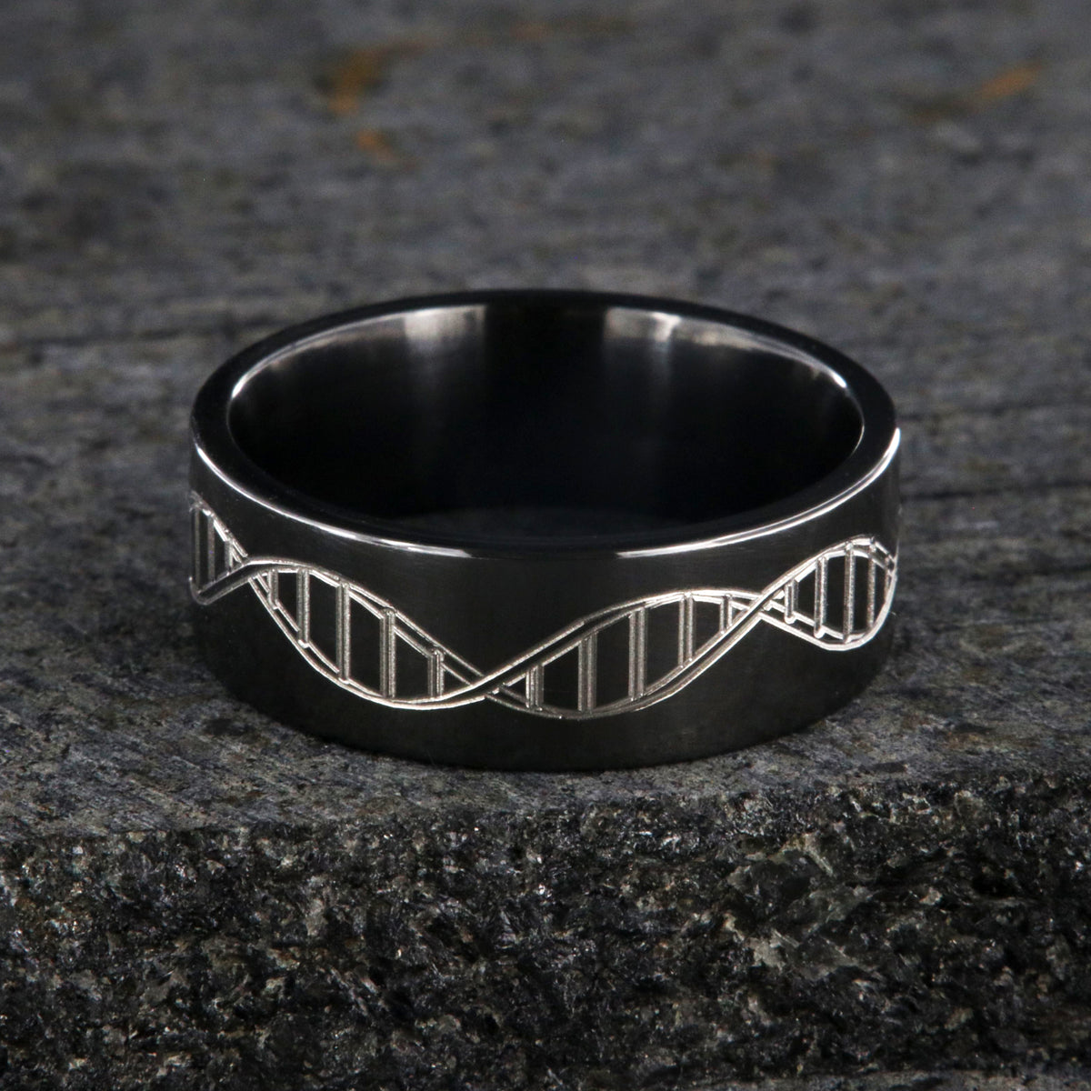 8mm wide black zirconium wedding ring with an etched DNA design