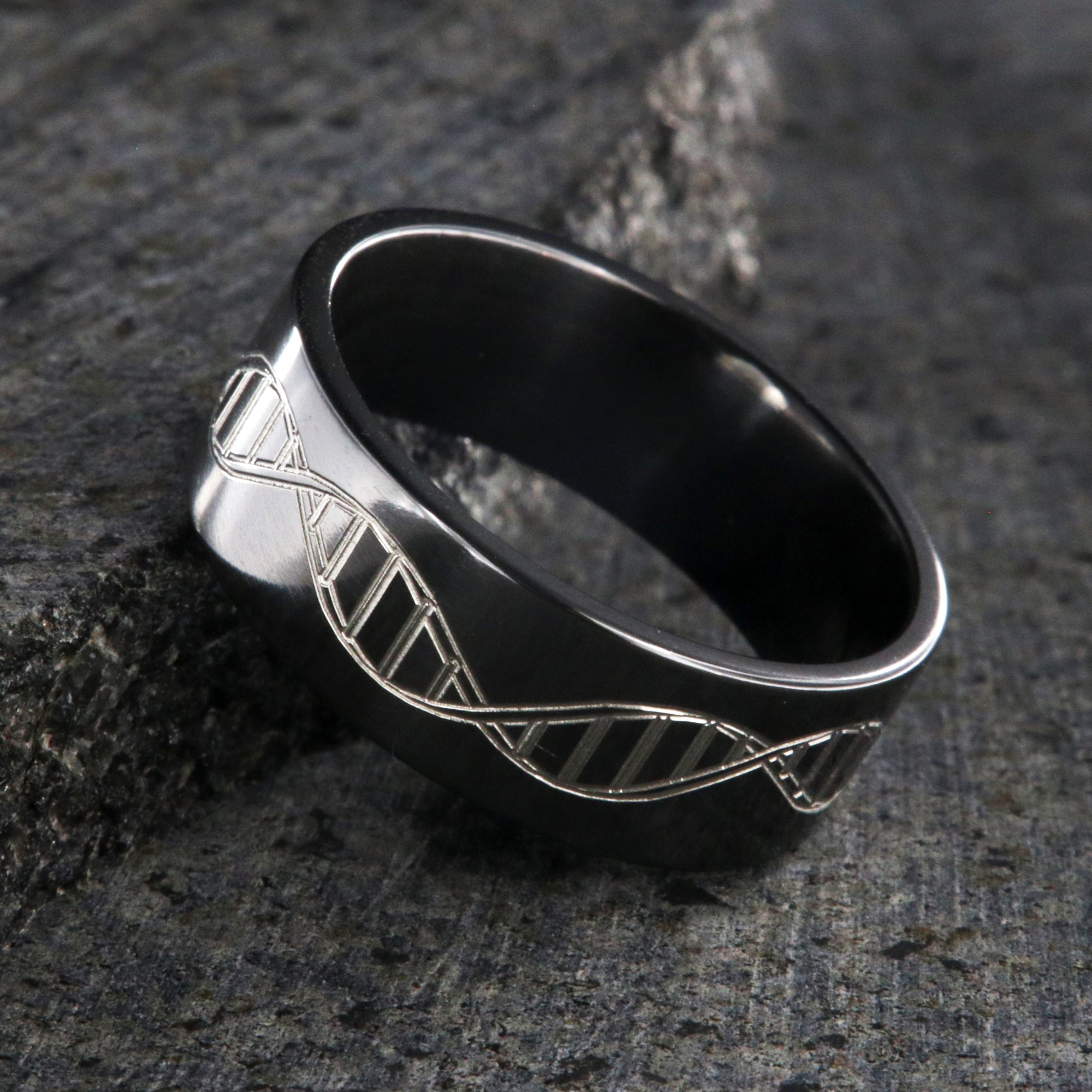 8mm wide black zirconium wedding ring with an etched DNA design