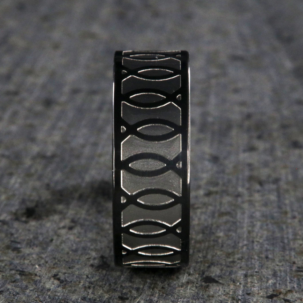 8mm wide black zirconium ring with a Jesus fish design