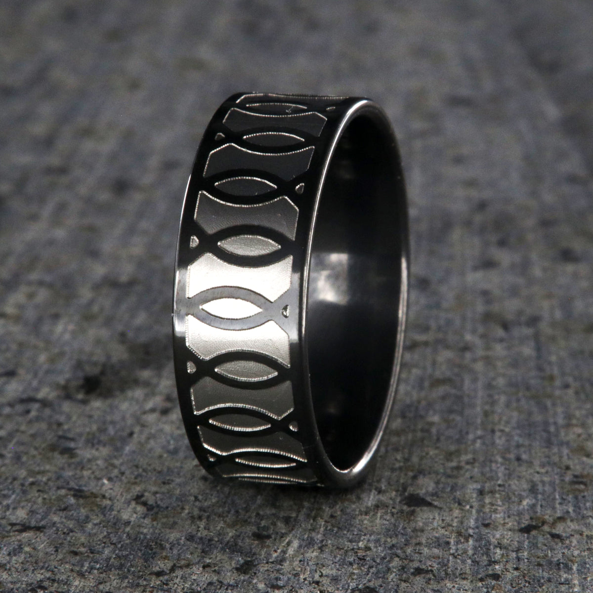 8mm wide black zirconium ring with a Jesus fish design