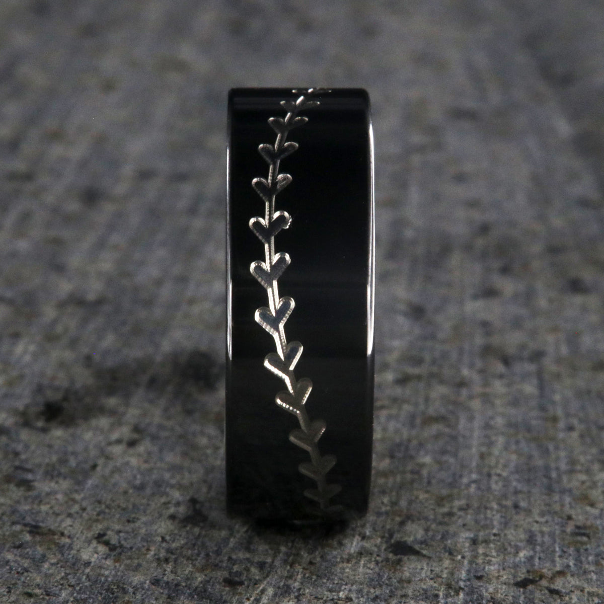 8mm wide black zirconium baseball ring with a flat profile and a two-tone baseball stitching