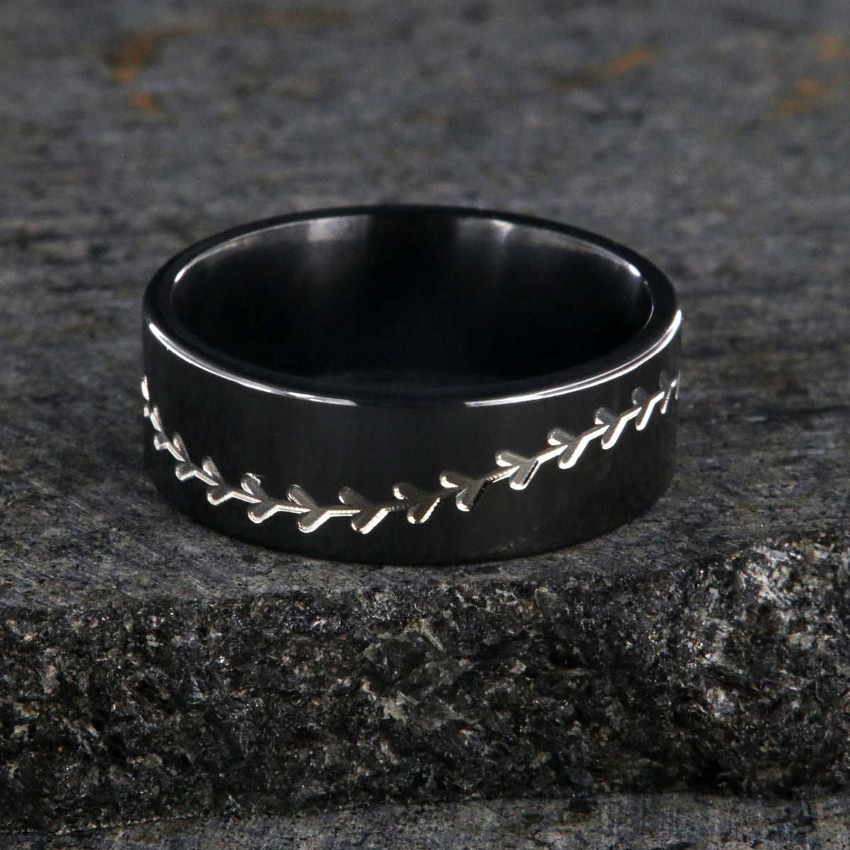 8mm wide black zirconium baseball ring with a flat profile and a two-tone baseball stitching