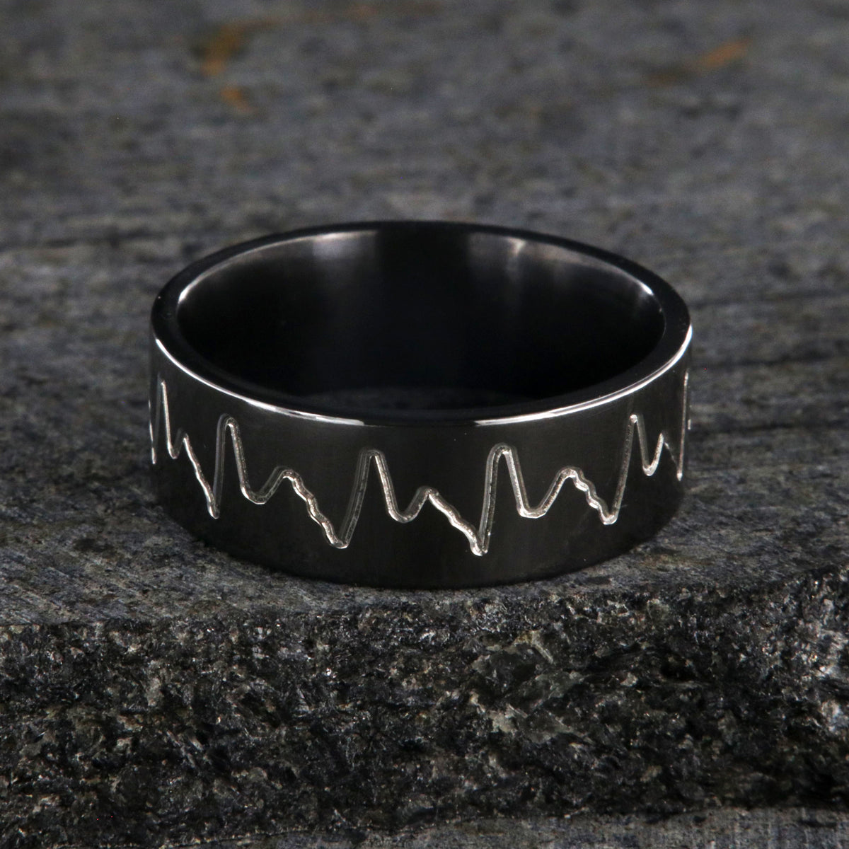 8mm wide black zirconium wedding band with an etched heartbeat design and a flat profile