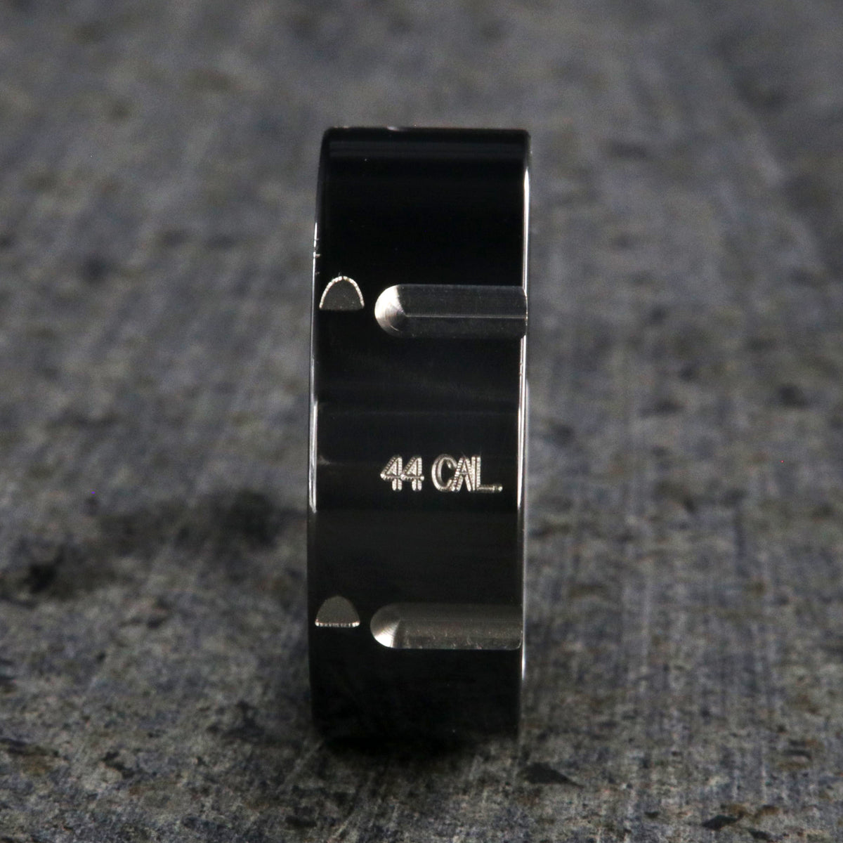 8mm wide black zirconium wedding band with .44 caliber design