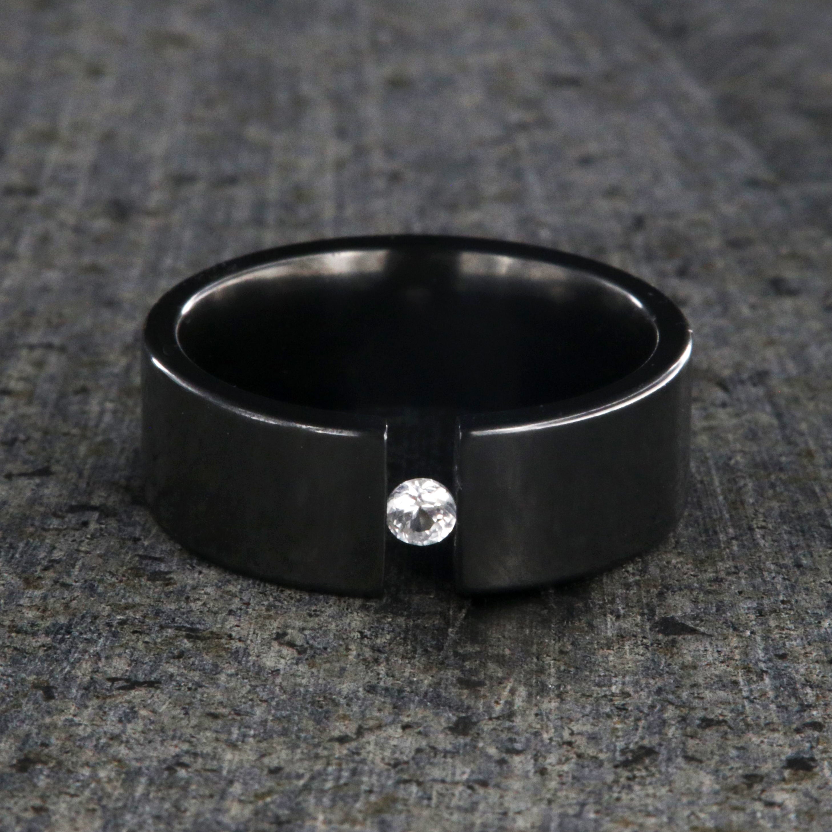 Tension Set Blue Sapphire in Black Zirconium Engagement Ring