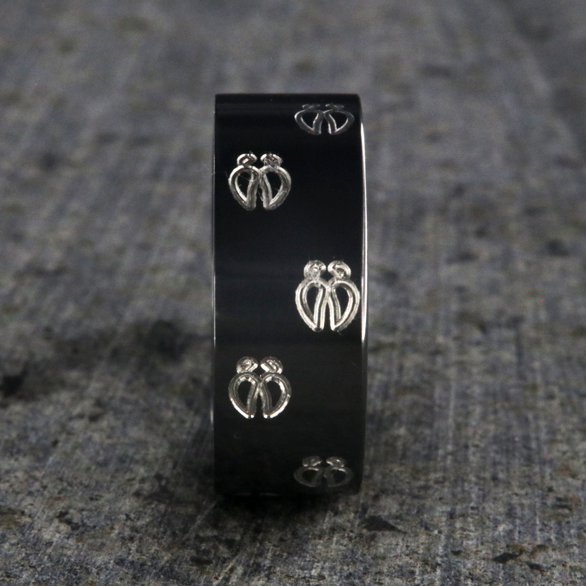 10mm wide black zirconium wedding band with a deer rack and tracks and a flat profile