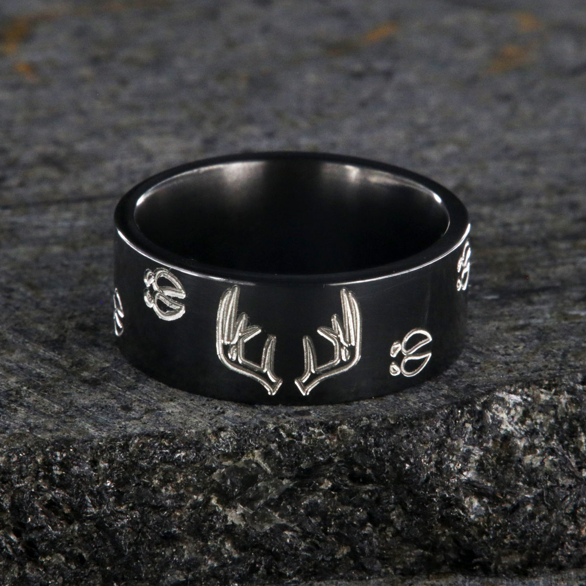 10mm wide black zirconium wedding band with a deer rack and tracks and a flat profile