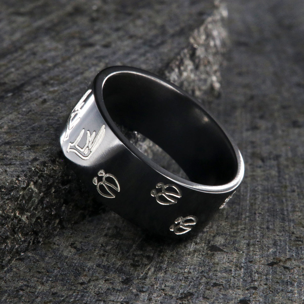 10mm wide black zirconium wedding band with a deer rack and tracks and a flat profile