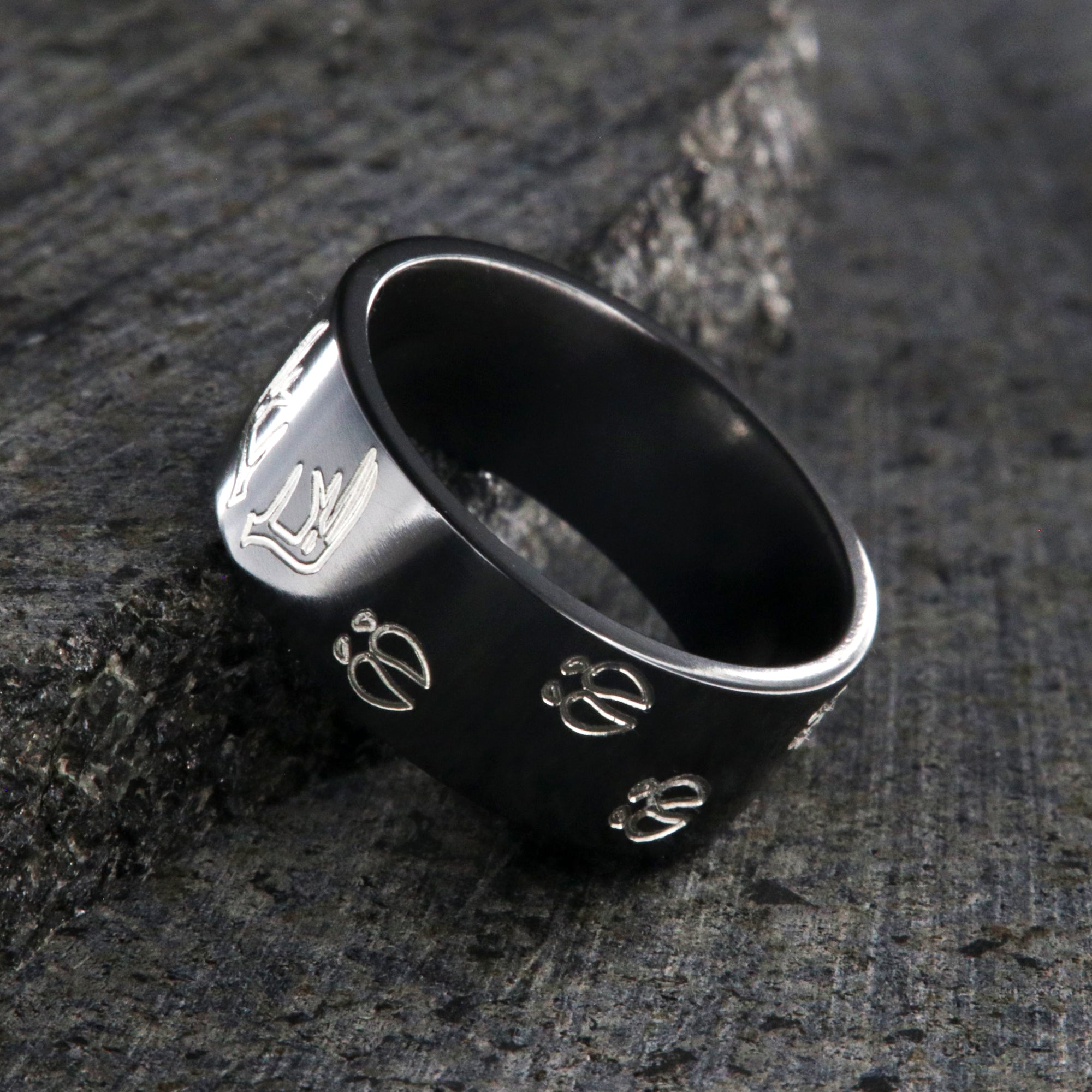 10mm wide black zirconium wedding band with a deer rack and tracks and a flat profile