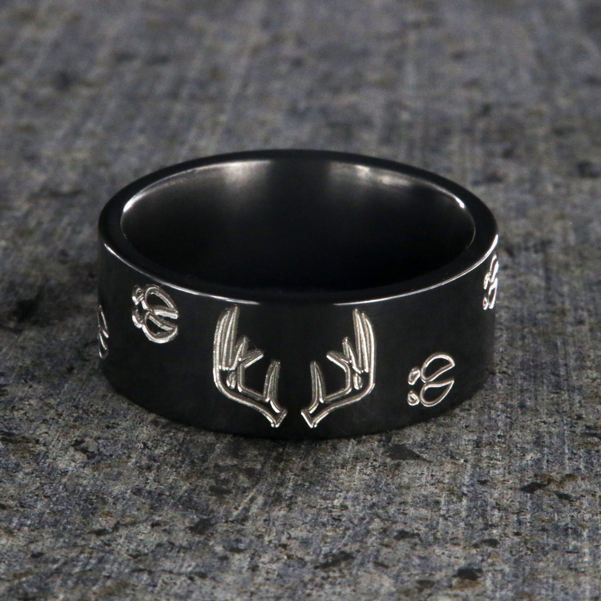 10mm wide black zirconium wedding band with a deer rack and tracks and a flat profile