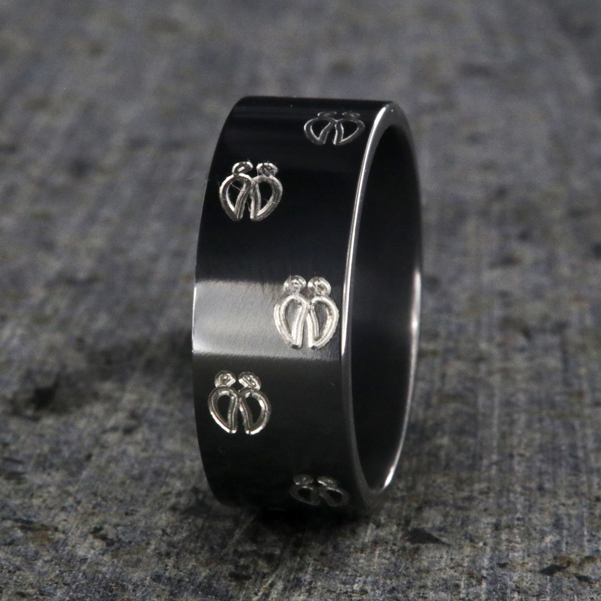 10mm wide black zirconium wedding band with a deer rack and tracks and a flat profile