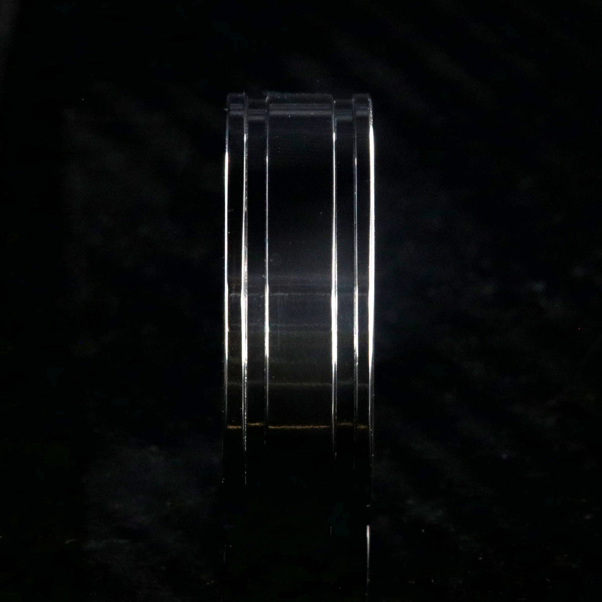 8mm wide polished black zirconium wedding band with dual edge grooves