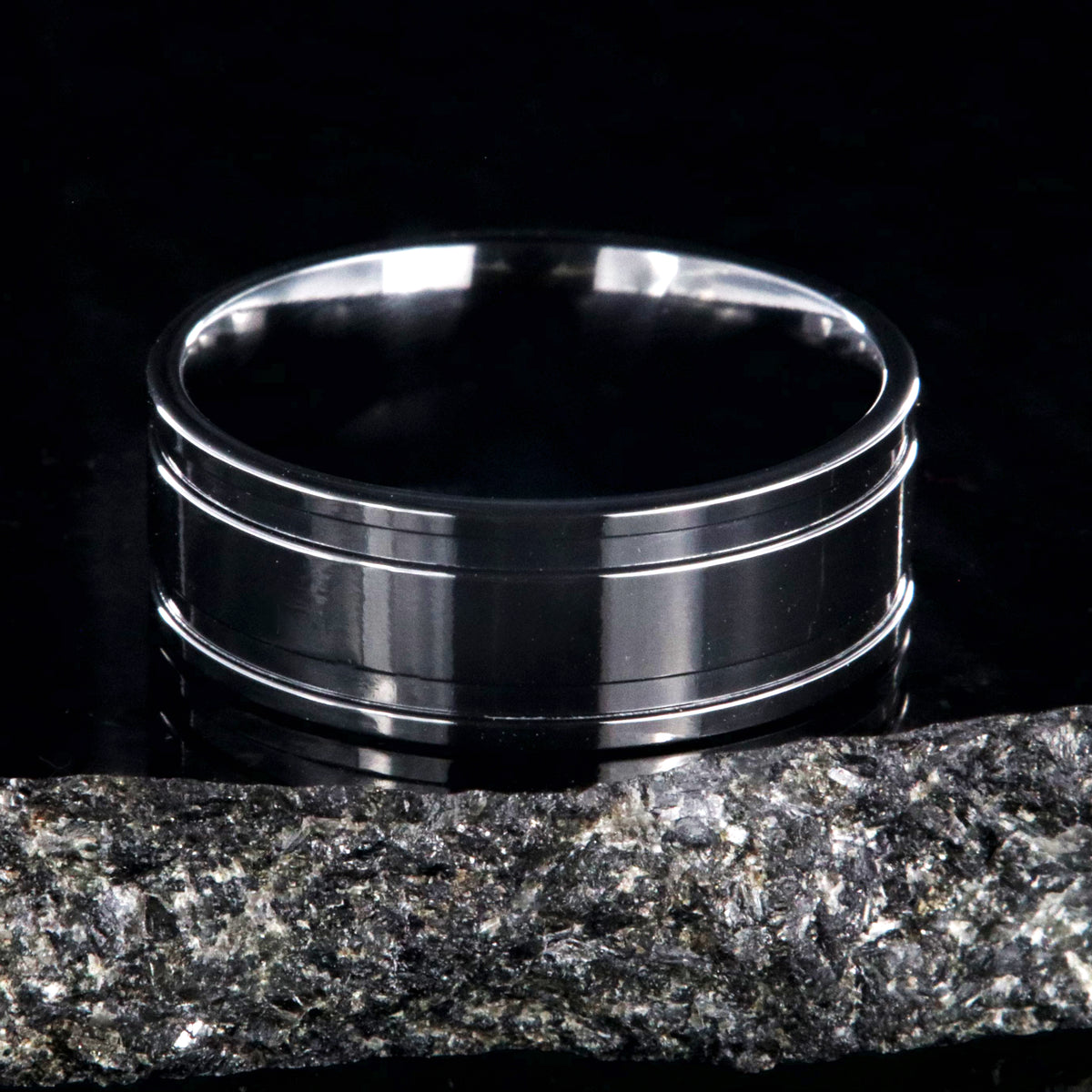 8mm wide polished black zirconium wedding band with dual edge grooves