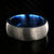 8mm wide titanium ring with a stone finish and blue sleeve