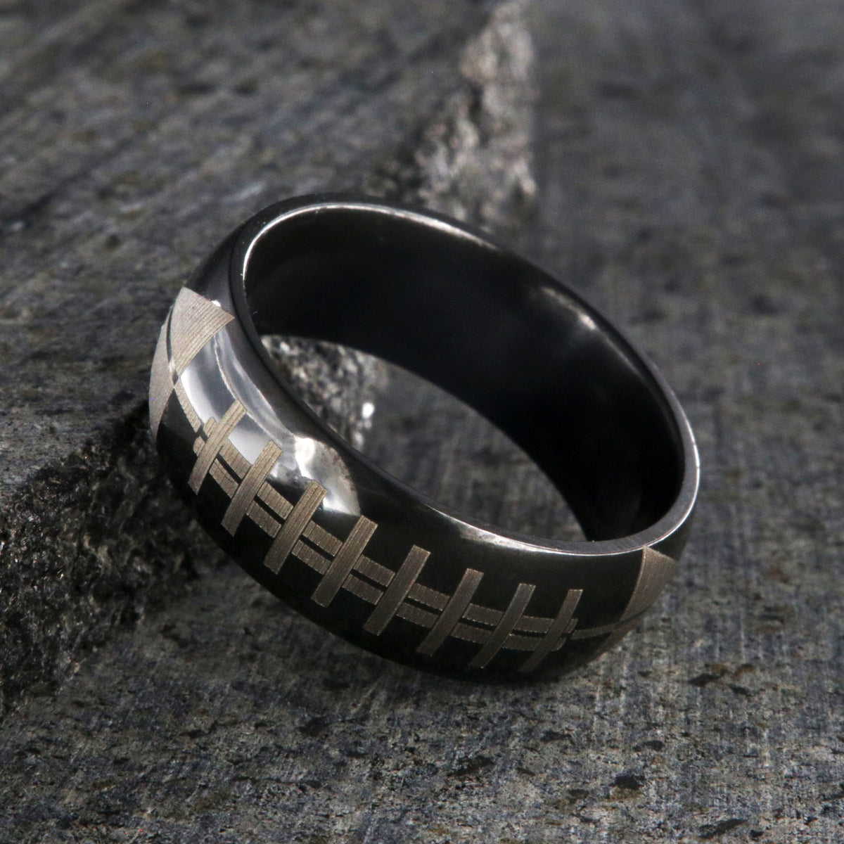 8mm wide black zirconium ring with football design