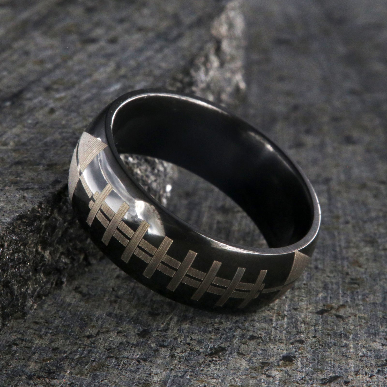 8mm wide black zirconium ring with football design