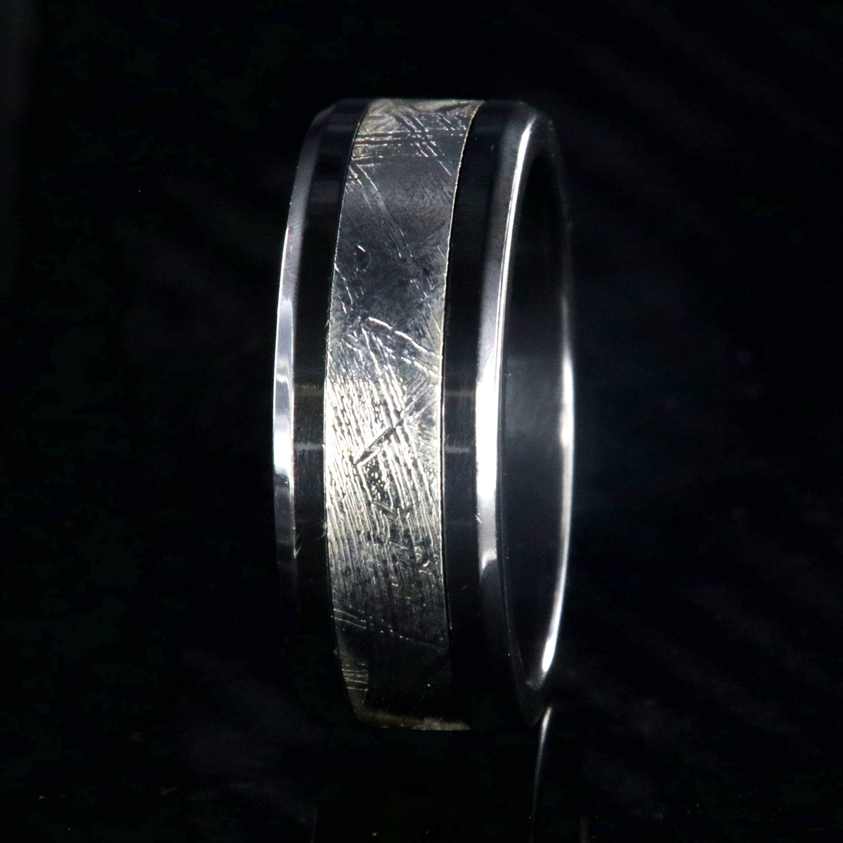 8mm wide meteorite ring with black zirconium edges and sleeve