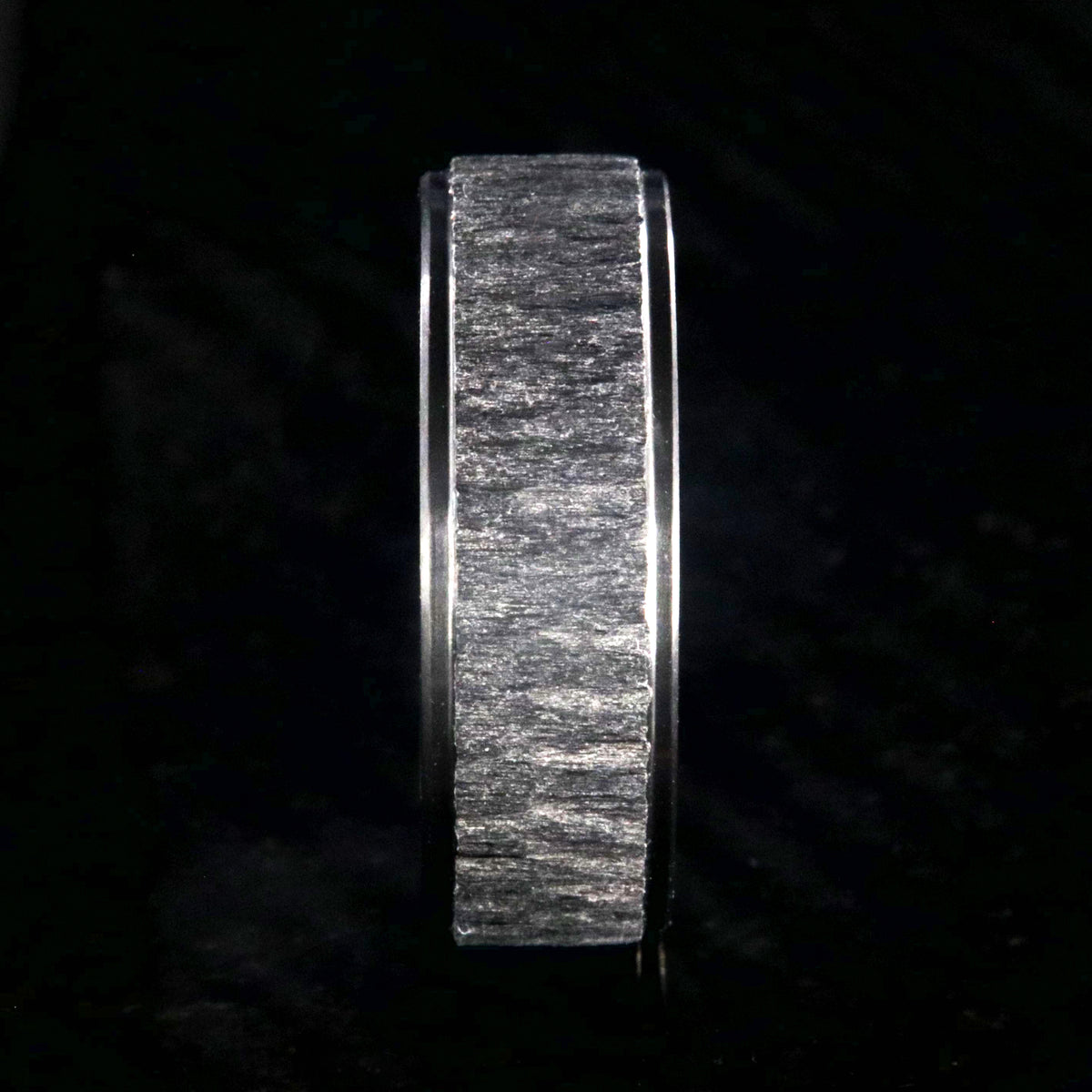 8mm wide black zirconium ring with a raised-center and tree bark finish