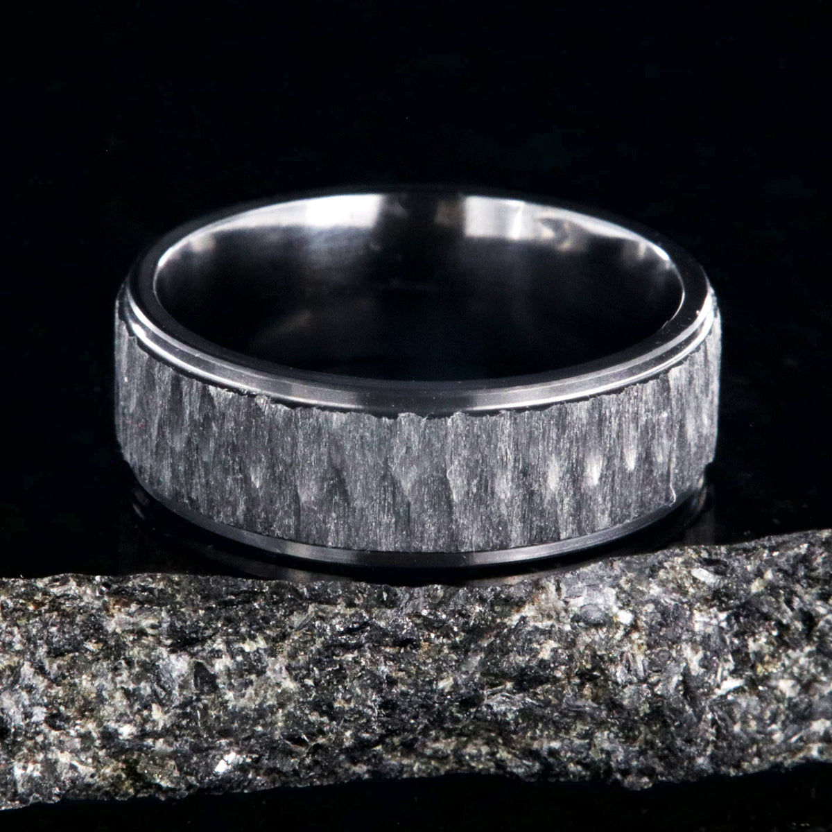 8mm wide black zirconium ring with a raised-center and tree bark finish