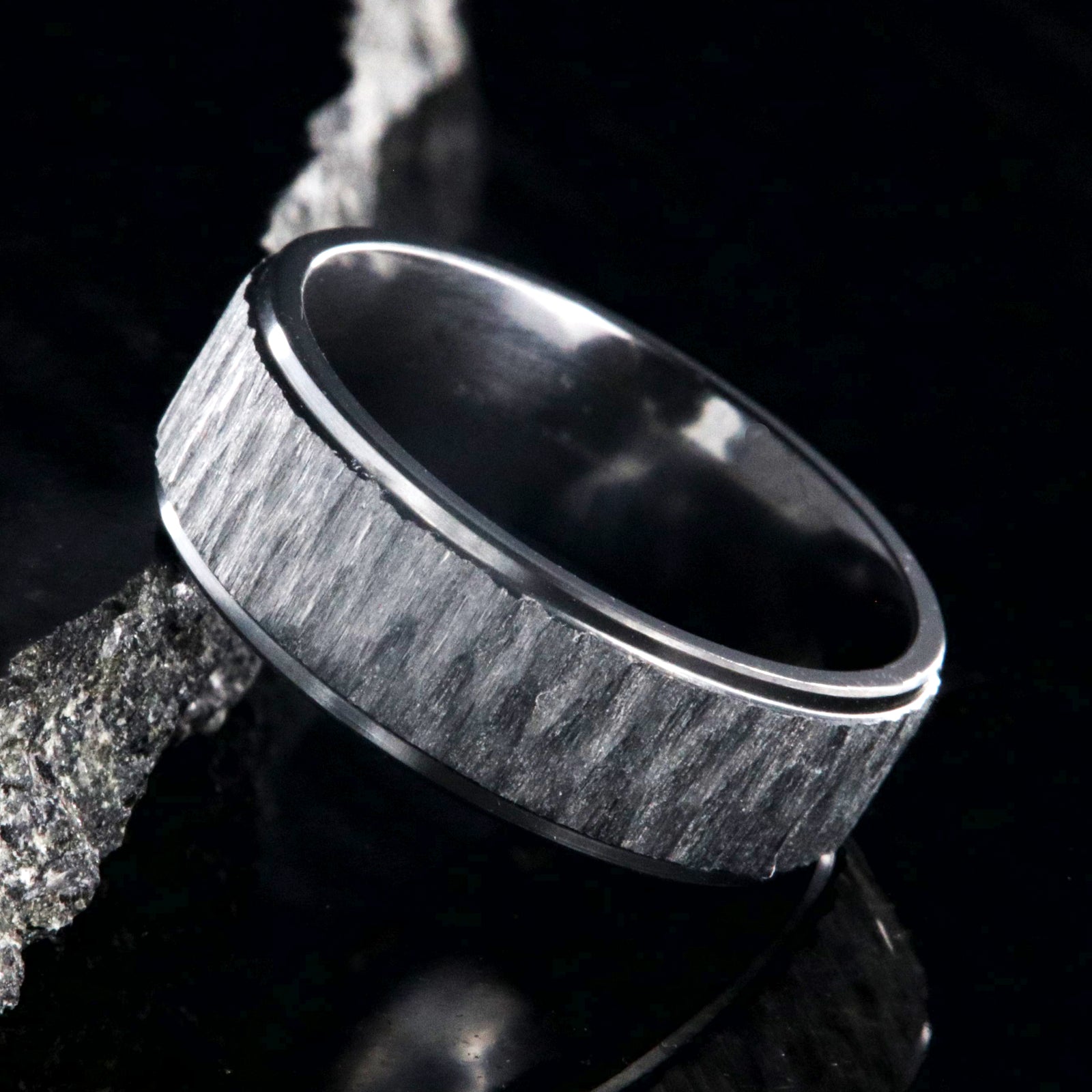 8mm wide black zirconium ring with a raised-center and tree bark finish