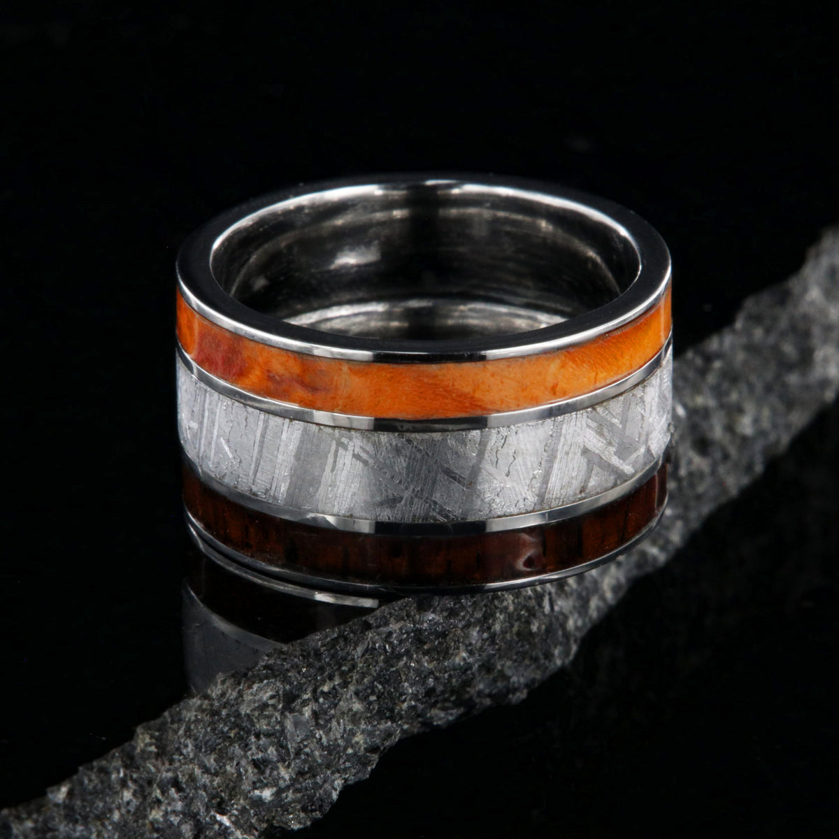 12mm wide ring with orange wood burl edge, a wide meteorite center inlay, and Arizona ironwood edge