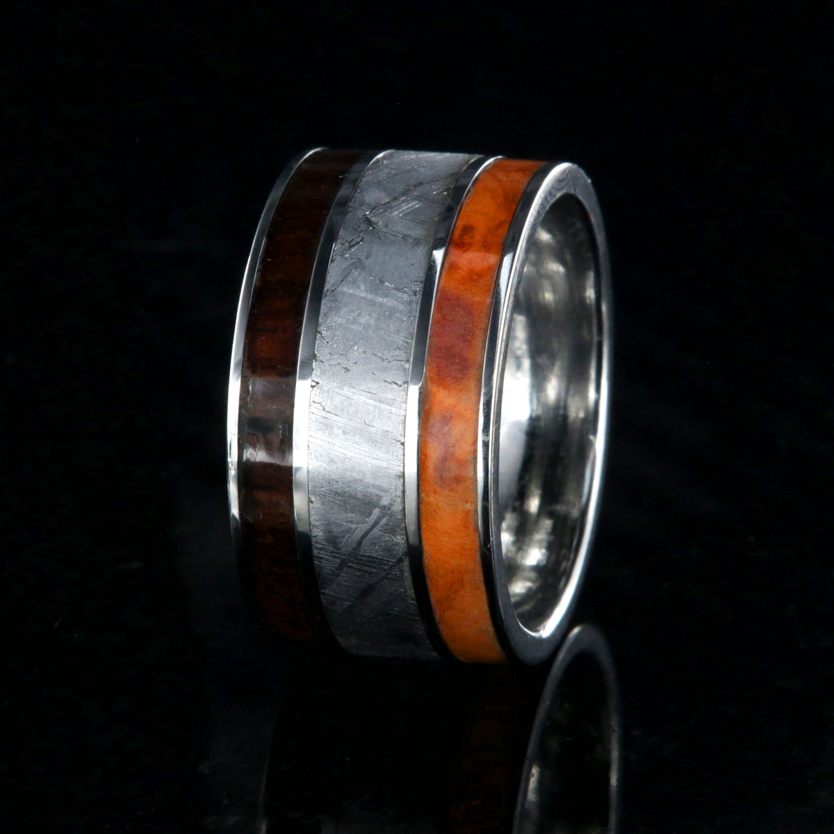 12mm wide ring with orange wood burl edge, a wide meteorite center inlay, and Arizona ironwood edge