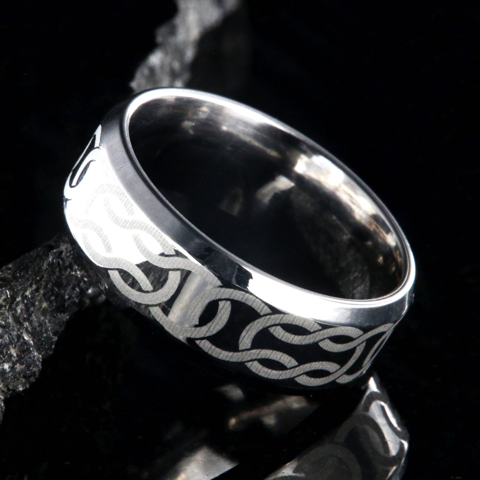 8mm wide cobalt ring with Celtic knot and beveled edges