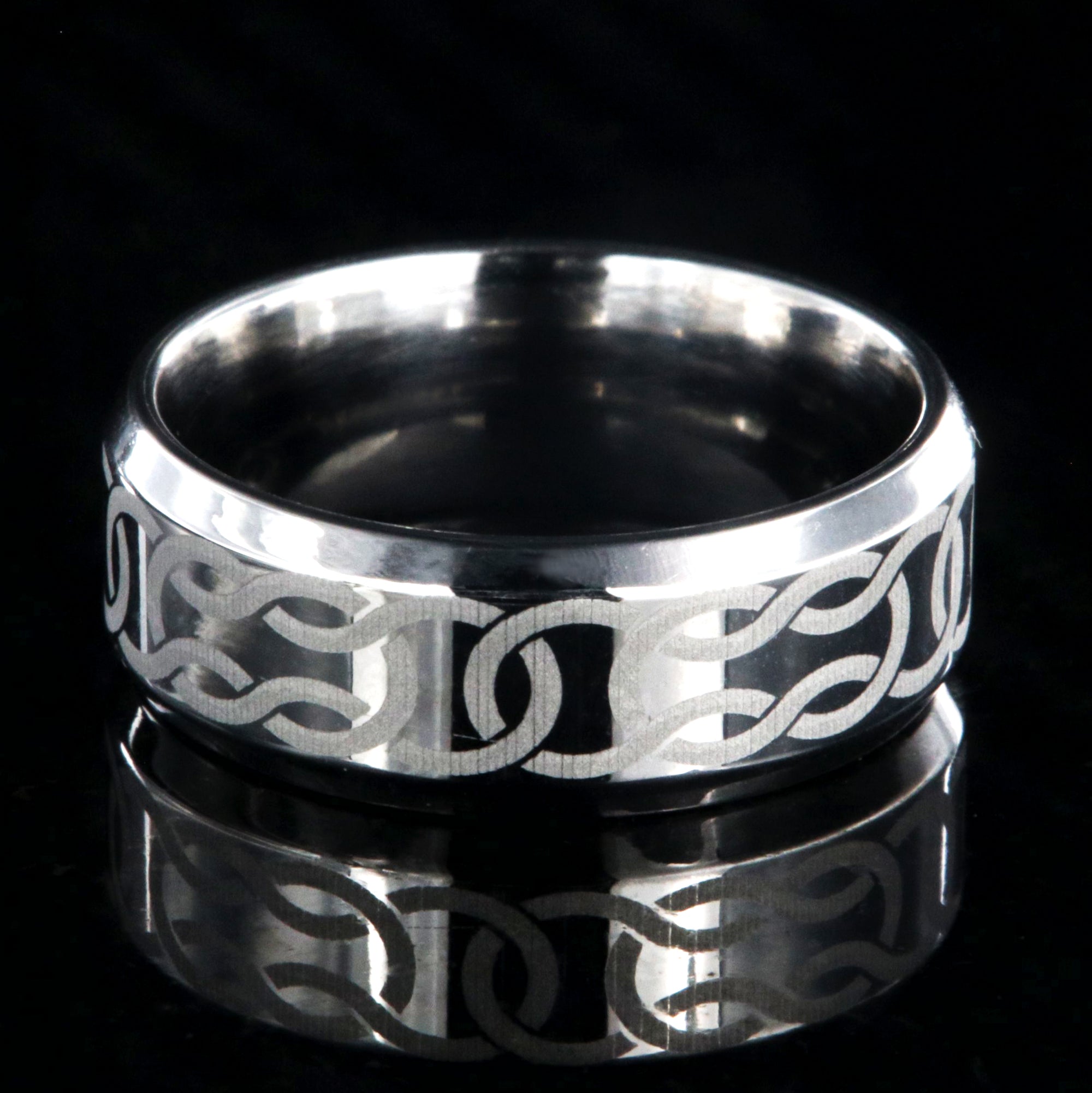 8mm wide cobalt ring with Celtic knot and beveled edges