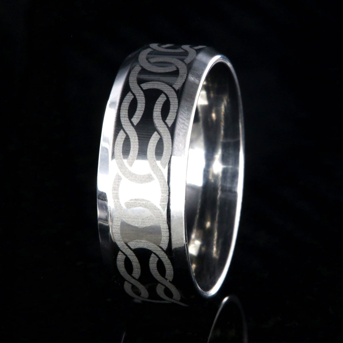 8mm wide cobalt ring with Celtic knot and beveled edges