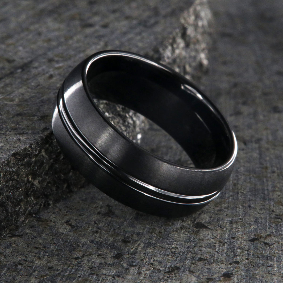 8mm wide black ceramic ring with a center groove and satin finish
