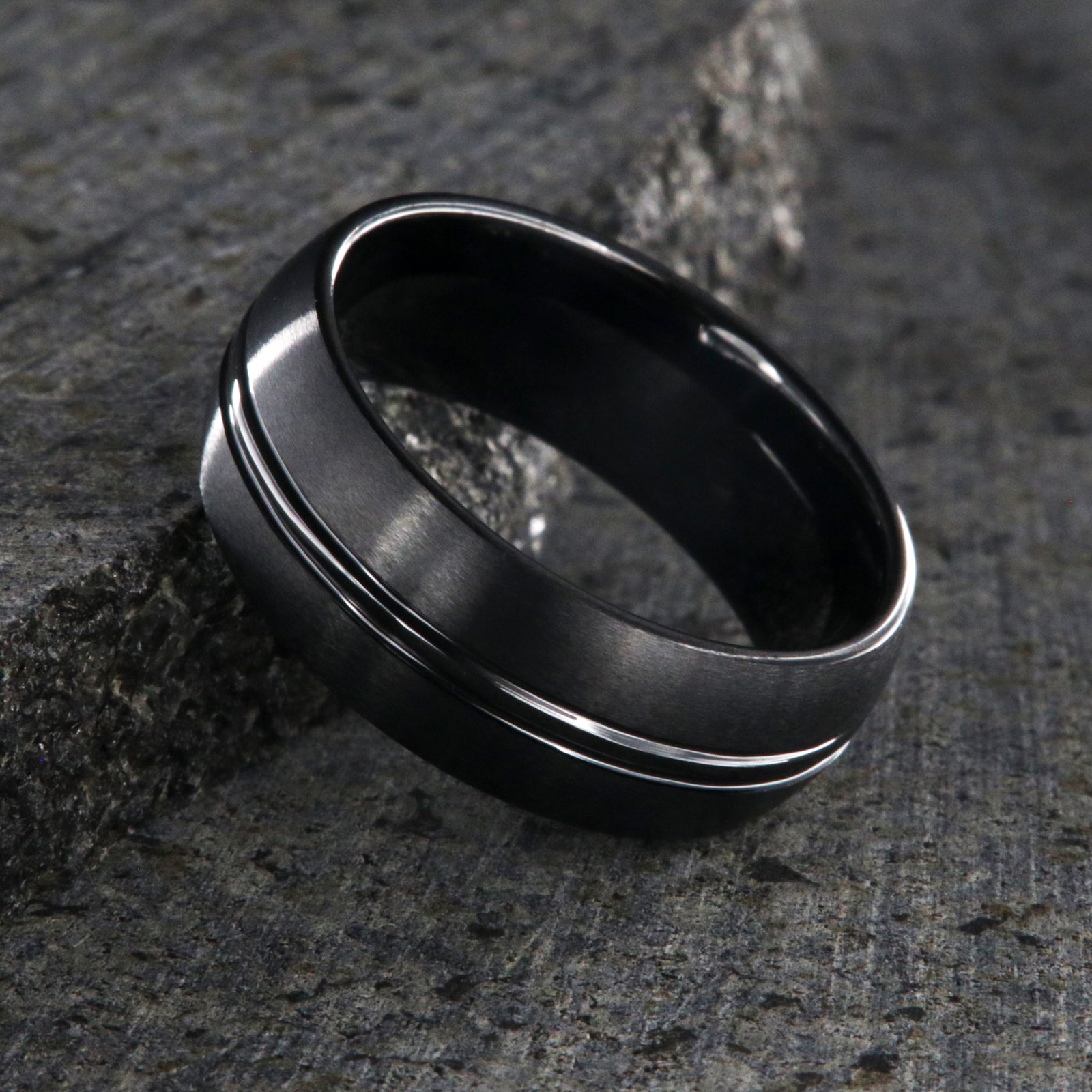 8mm wide black ceramic ring with a center groove and satin finish