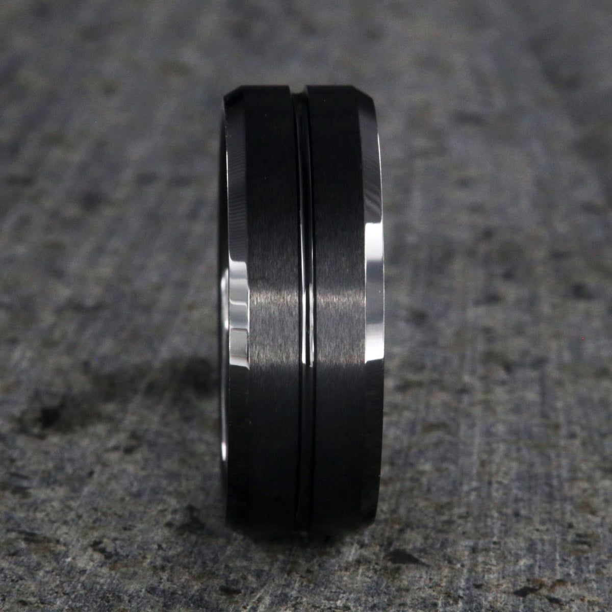 8mm wide black ceramic ring with beveled edges, a polished center groove, and a matte finish